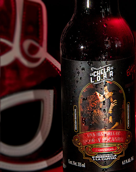 CERVEZA LA CHELA DE LORA EL TRI CON MEZCAL